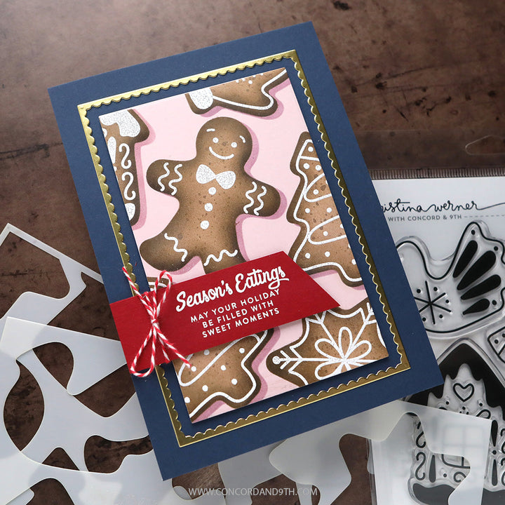 Concord & 9th Kristina Werner Gingerbread Cookies Stencils — a "Season's Eatings" card with a stenciled pink gingerbread-cookie pattern background.