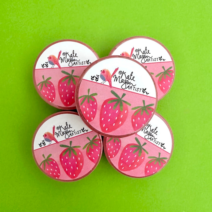 Five washi tapes with strawberry illustrations and the text 'Kate Magic Artist' arranged on a bright green background.