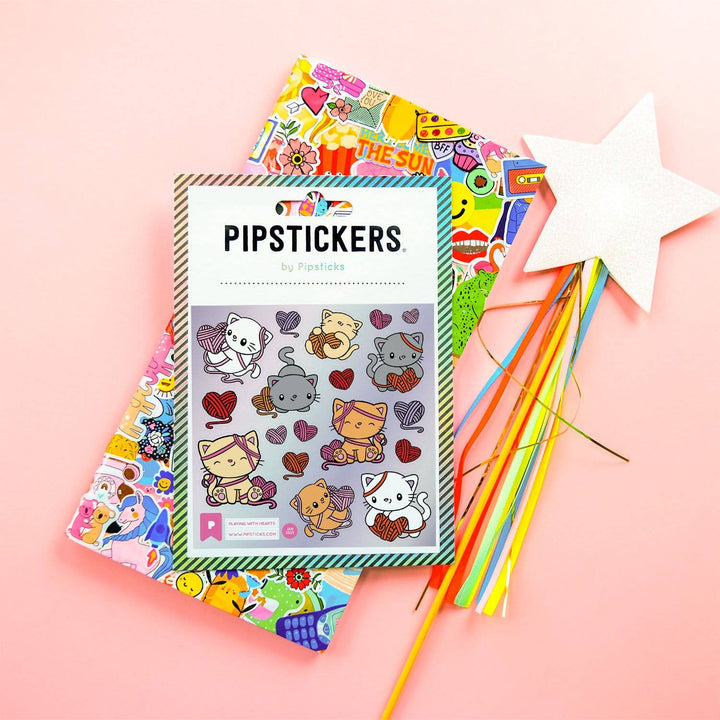 Pipsticks stickers with colorful designs on a pink background