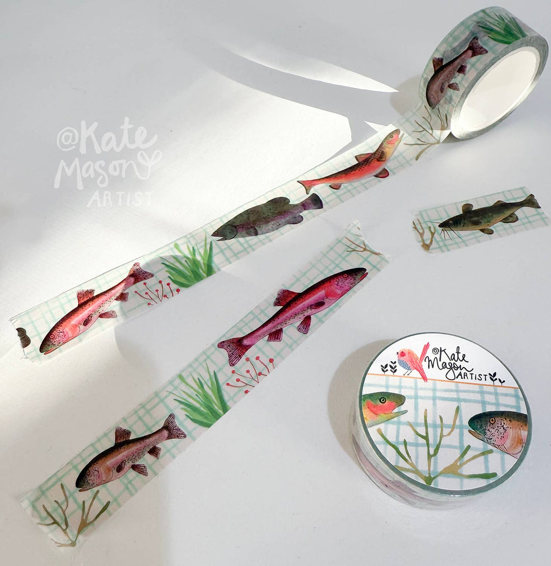 Decorative tape with fish design on a white background rolled out